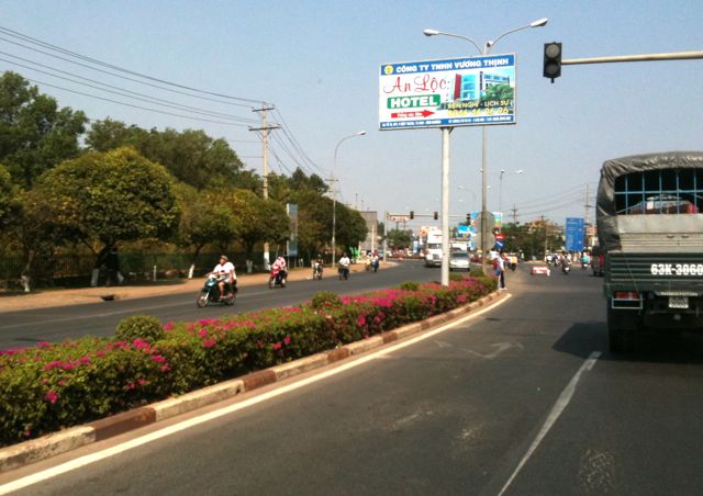 paved road to Binh Duong, one-hour ride from HoChiMinhCity